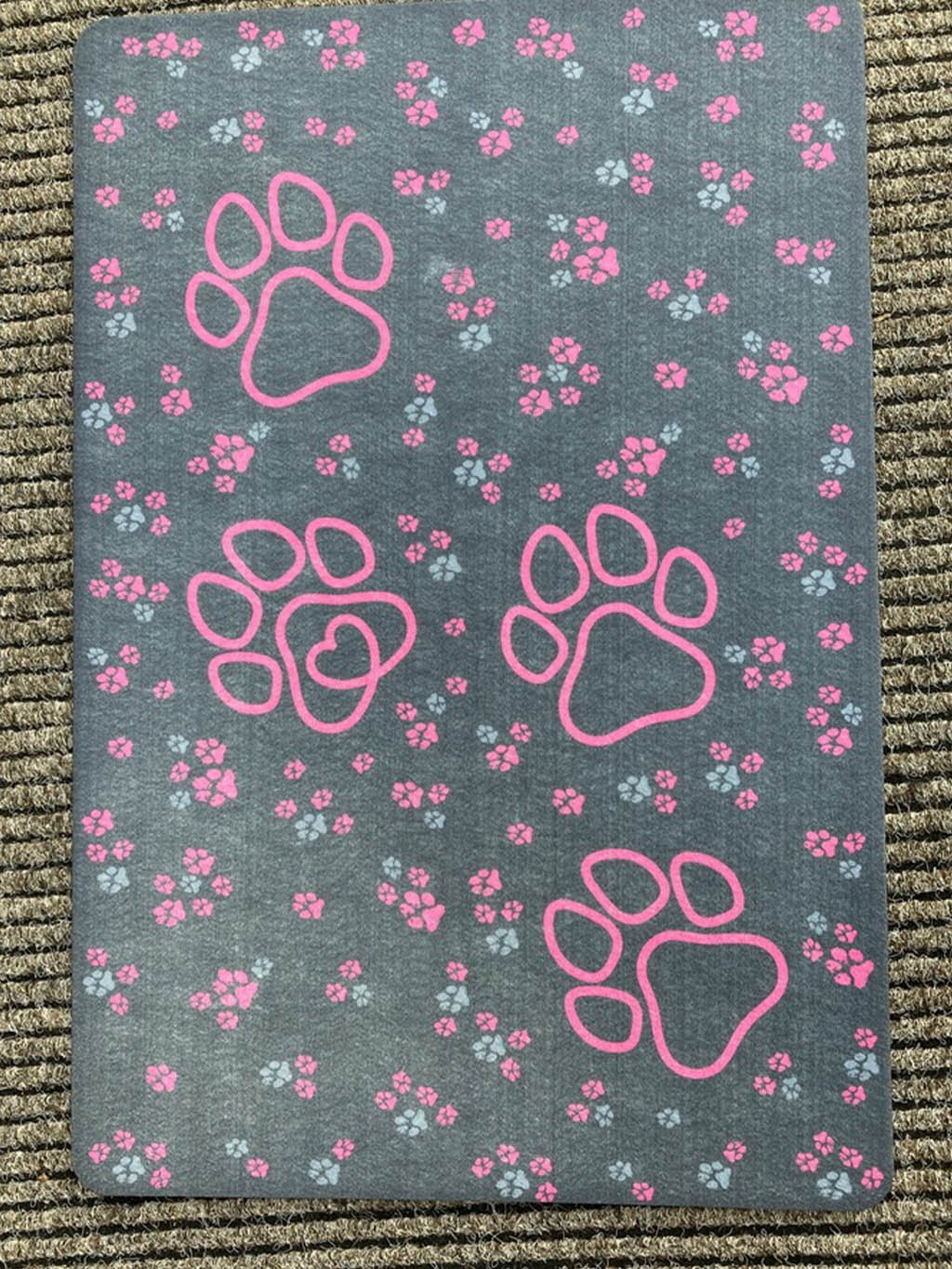 Doormat with pink paws