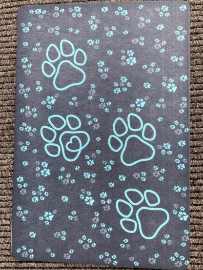 Doormat with a turquoise paws 2