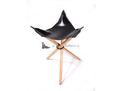 Tripod stool with leather seat.