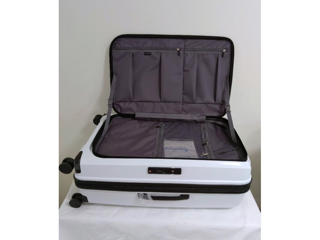 Cestovní skořepinový kufr s předním plněním velký bílý