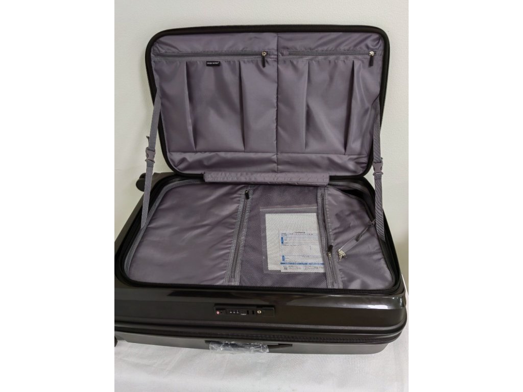 Cestovní skořepinový kufr s předním plněním velký černý