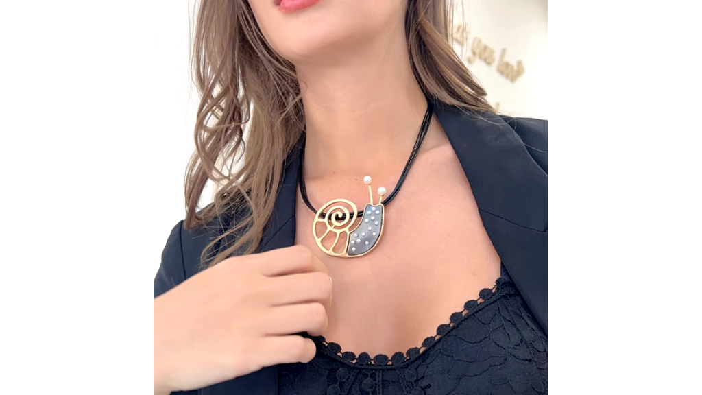 Necklace with large snail pendant