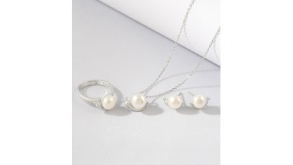 Srebrny zestaw biżuterii ślimakowej z perłami