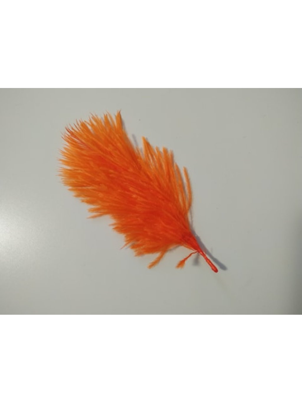 Pštrosí peří oranžové 5 - 12 cm