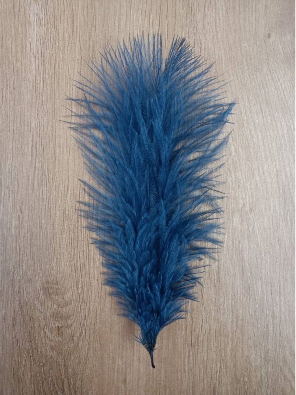 Pštrosí peří tmavě modré 20 - 25 cm