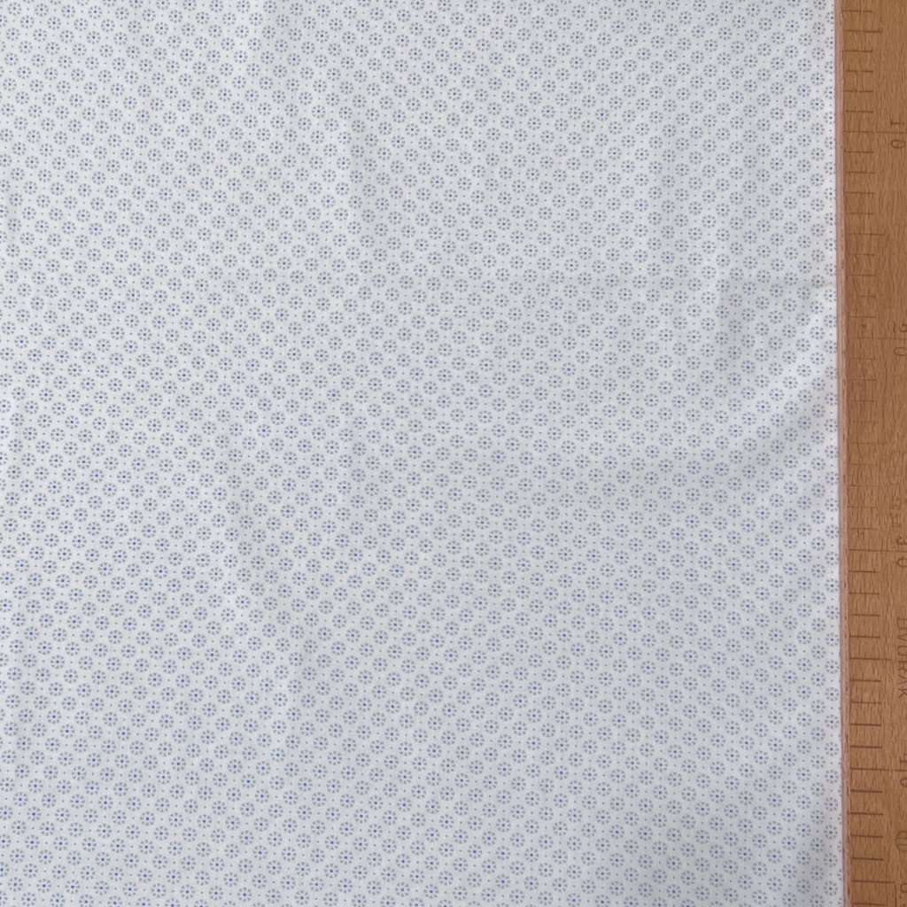 Kytička s tečkou na světle modré