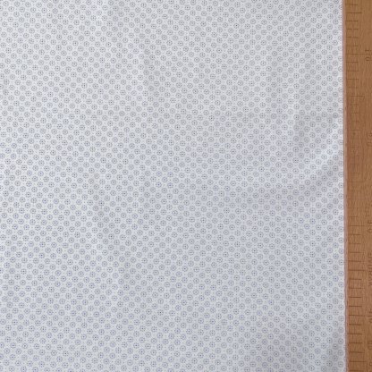 Kytička s tečkou na světle modré