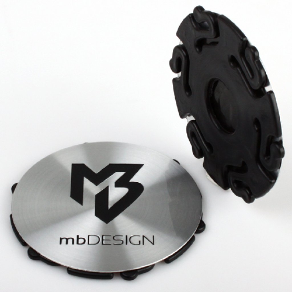 krytka průměr 67/68mm(vnitřní,vnější) mbDESIGN (NK-MB69-S4), stříbrná nerez, černé logo