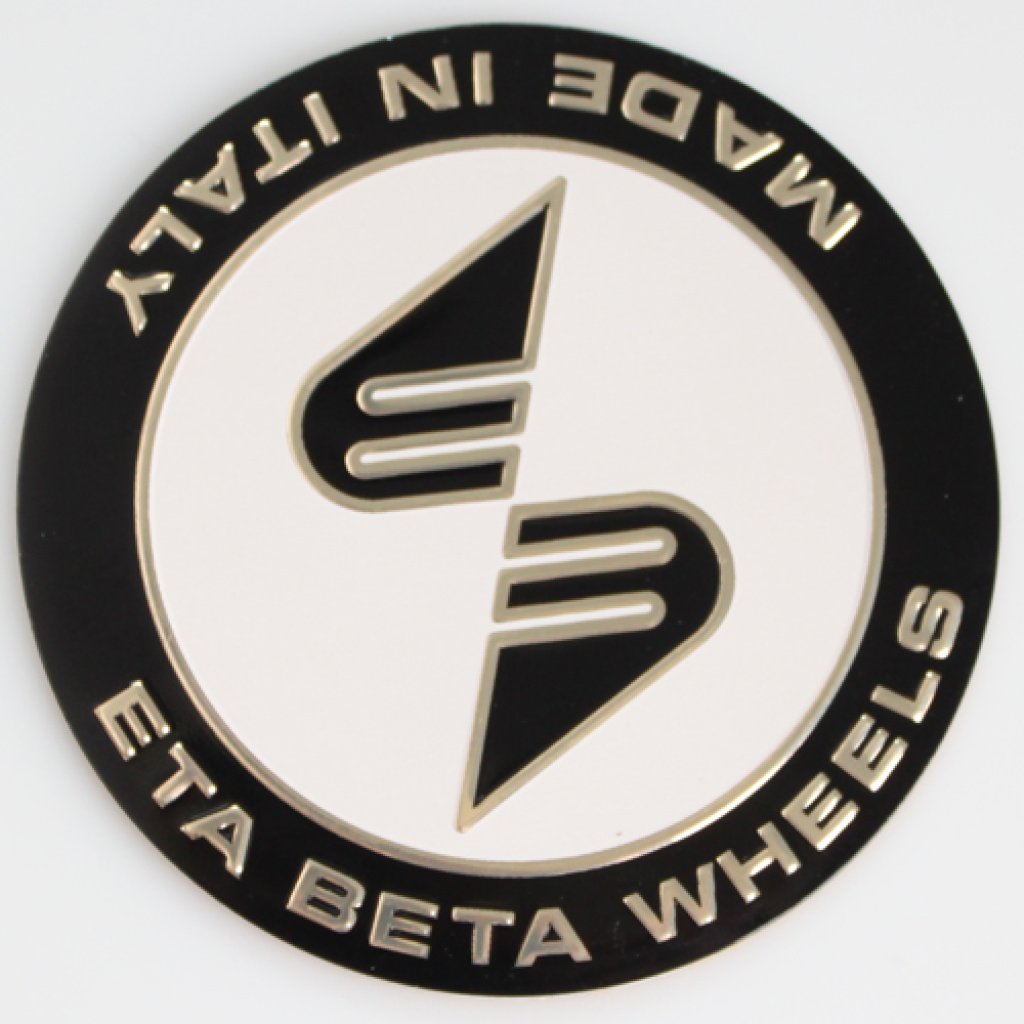 Logo (emblem) průměr 67mm, ETA BETA černo bílé, kovové, zlatý nápis