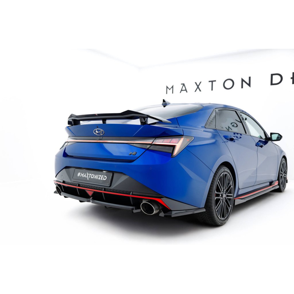 Maxton Design středový spoiler pod zadní nárazník s žebrováním pro Hyundai Elantra N Mk7, černý lesklý plast ABS