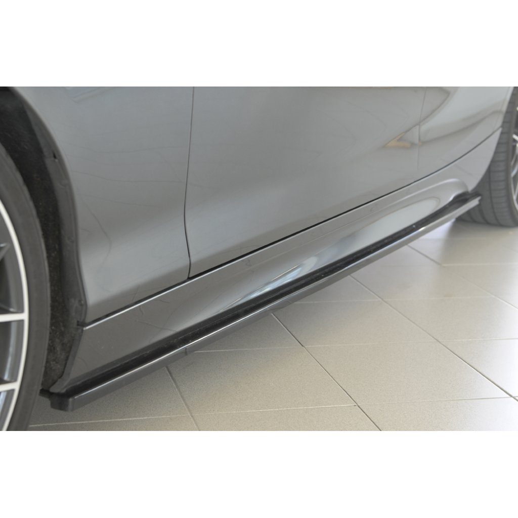 Rieger spoiler pod boční práh mont. strana levá pro BMW řada 1 F20 sedan / 4-dvéř. vč. faceliftu, 05/2015-, 09/11-03/2015, plast ABS lakovaný do černé lesklé barvy