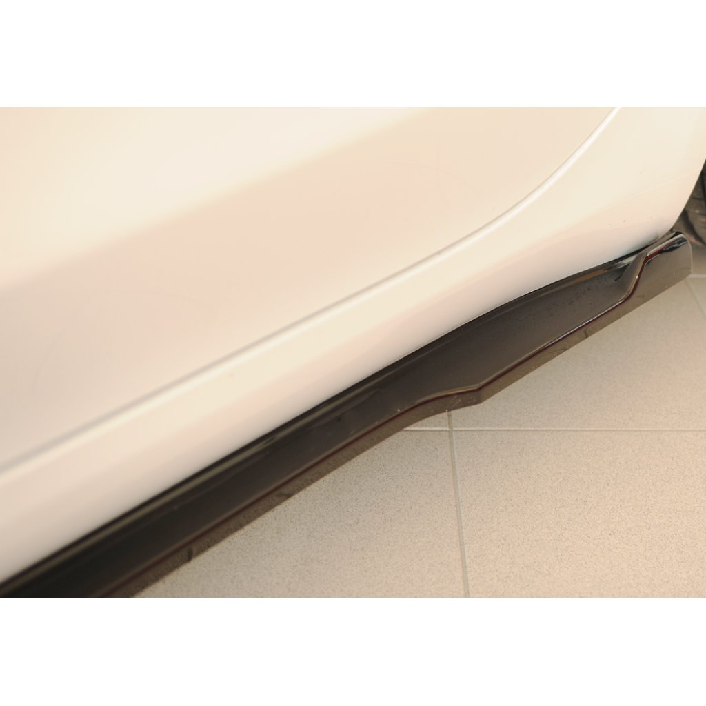 Rieger spoiler pod boční práh mont. strana levá pro Tesla Model 3 003, 06/18-, plast ABS lakovaný do černé lesklé barvy