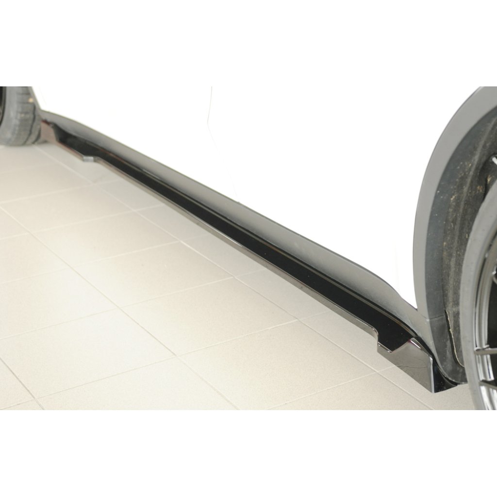 Rieger spoiler pod boční práh mont. strana levá pro Tesla Model Y 003, 03/20-, plast ABS lakovaný do černé lesklé barvy