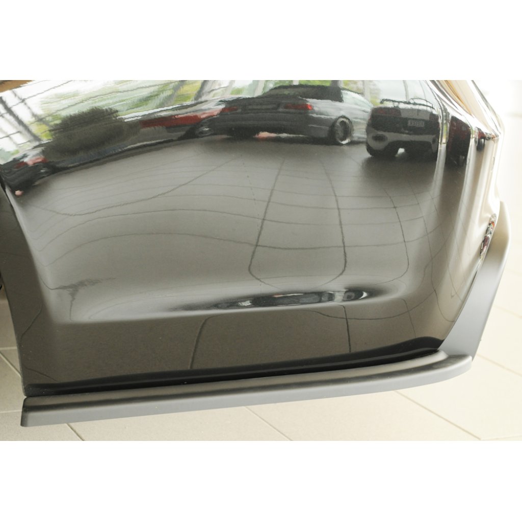 Rieger spoiler pod zadní nárazník na levé straně pro BMW řada 3 E91 touring r.v. 09/08-, plast ABS bez povrchové úpravy