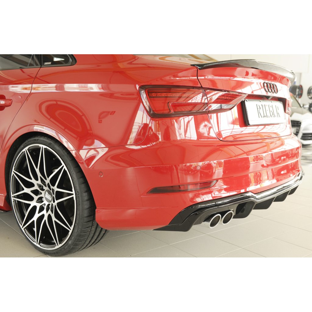 Rieger vložka zadního nárazníku pro Audi A3 8V 3-dvéř. (convertible 8V7), 5-dvéř. (sedan 8VS) po faceliftu, plast ABS lakovaný do černé lesklé barvy, pro dvojitou koncovku vlevo