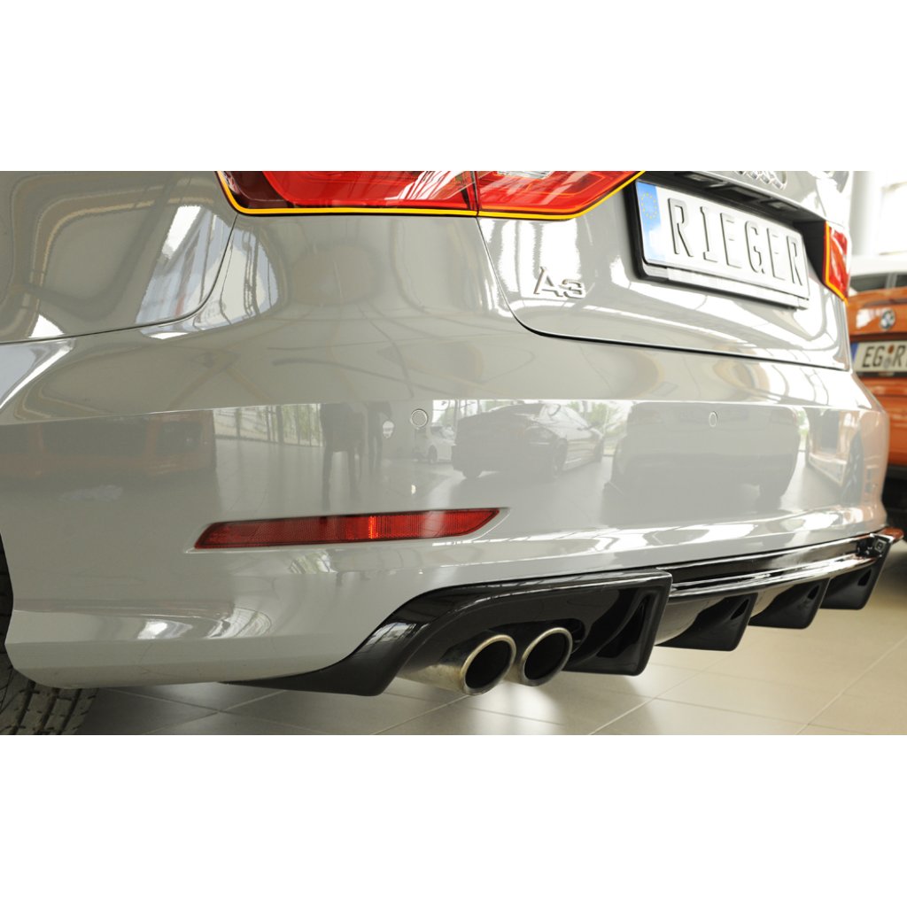 Rieger vložka zadního nárazníku pro Audi A3 8V 3-dvéř. (convertible 8V7), 5-dvéř. (sedan 8VS) před faceliftem, plast ABS lakovaný do černé lesklé barvy, pro dvojitou koncovku vlevo