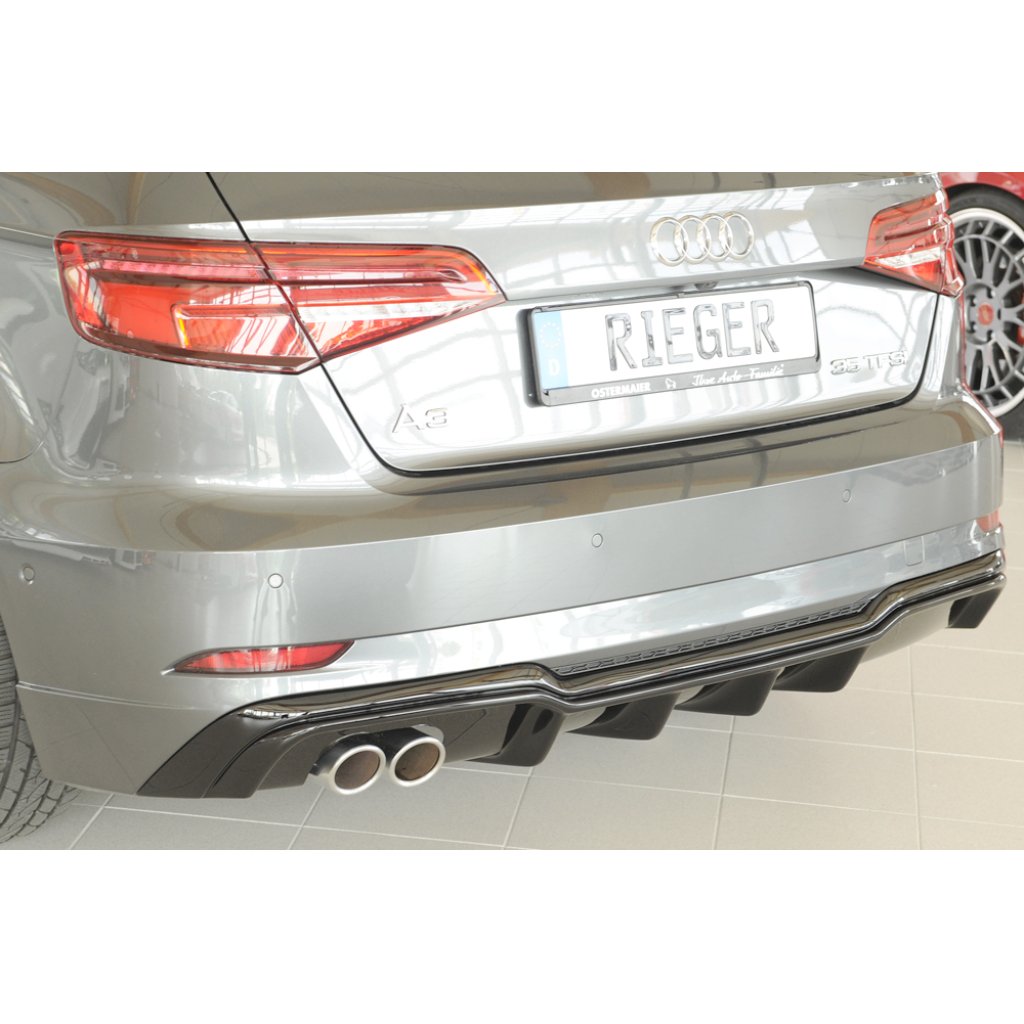 Rieger vložka zadního nárazníku pro Audi A3 8V 3-dvéř. (hatchback 8V1), 5-dvéř. (sportback 8VA) po faceliftu, plast ABS lakovaný do černé lesklé barvy, pro dvojitou koncovku vlevo