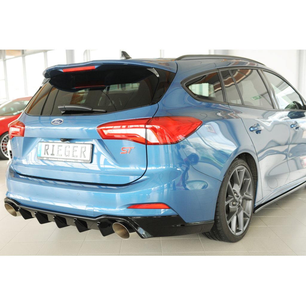 Rieger vložka zadního nárazníku pro Ford Focus 4 DEH 5-dvéř. (combi), plast ABS lakovaný do černé lesklé barvy, pro sportovní koncovky vlevo/vpravo 115 mm