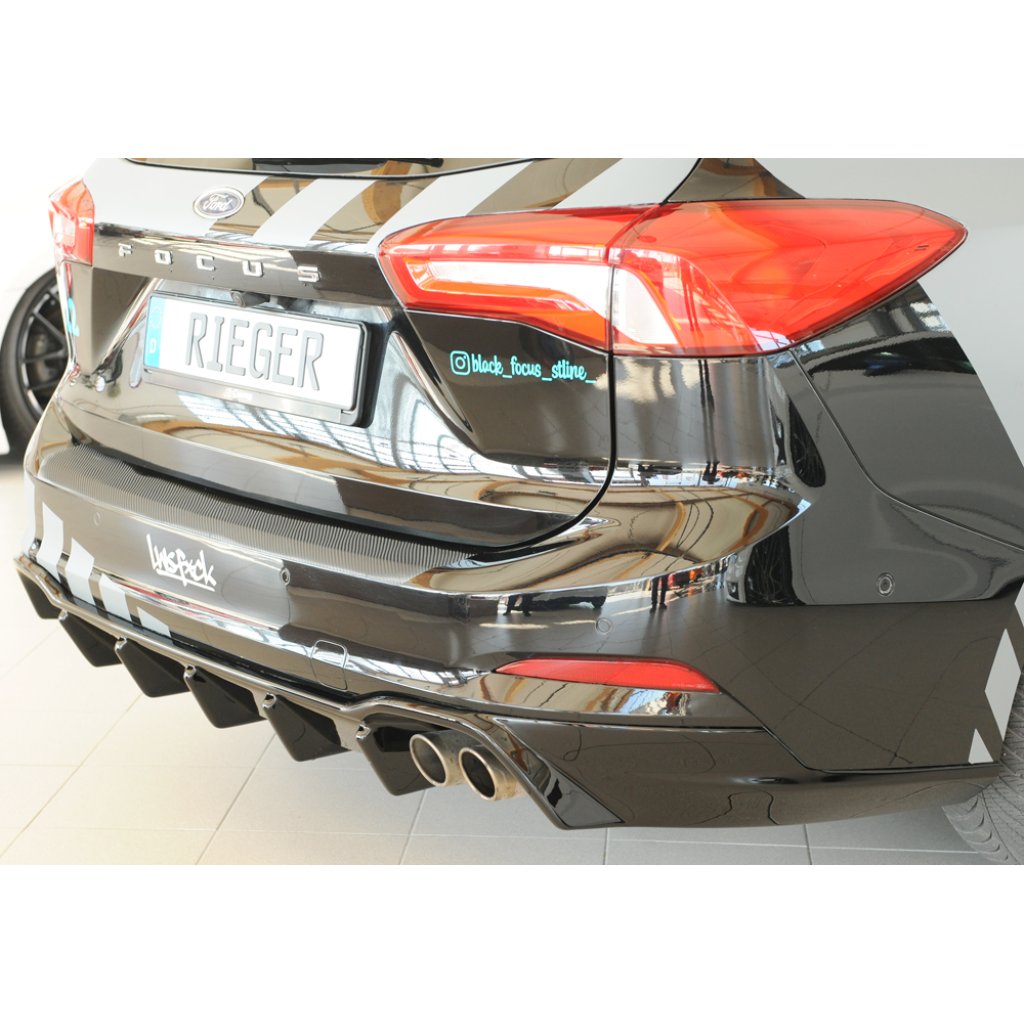 Rieger vložka zadního nárazníku (pro vozy s tažným zařízením) pro Ford Focus 4 DEH 5-dvéř. (combi), plast ABS lakovaný do černé lesklé barvy, pro orig. koncovky 2x70 mm