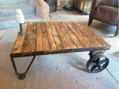 Industrial coffee table with solid wheels